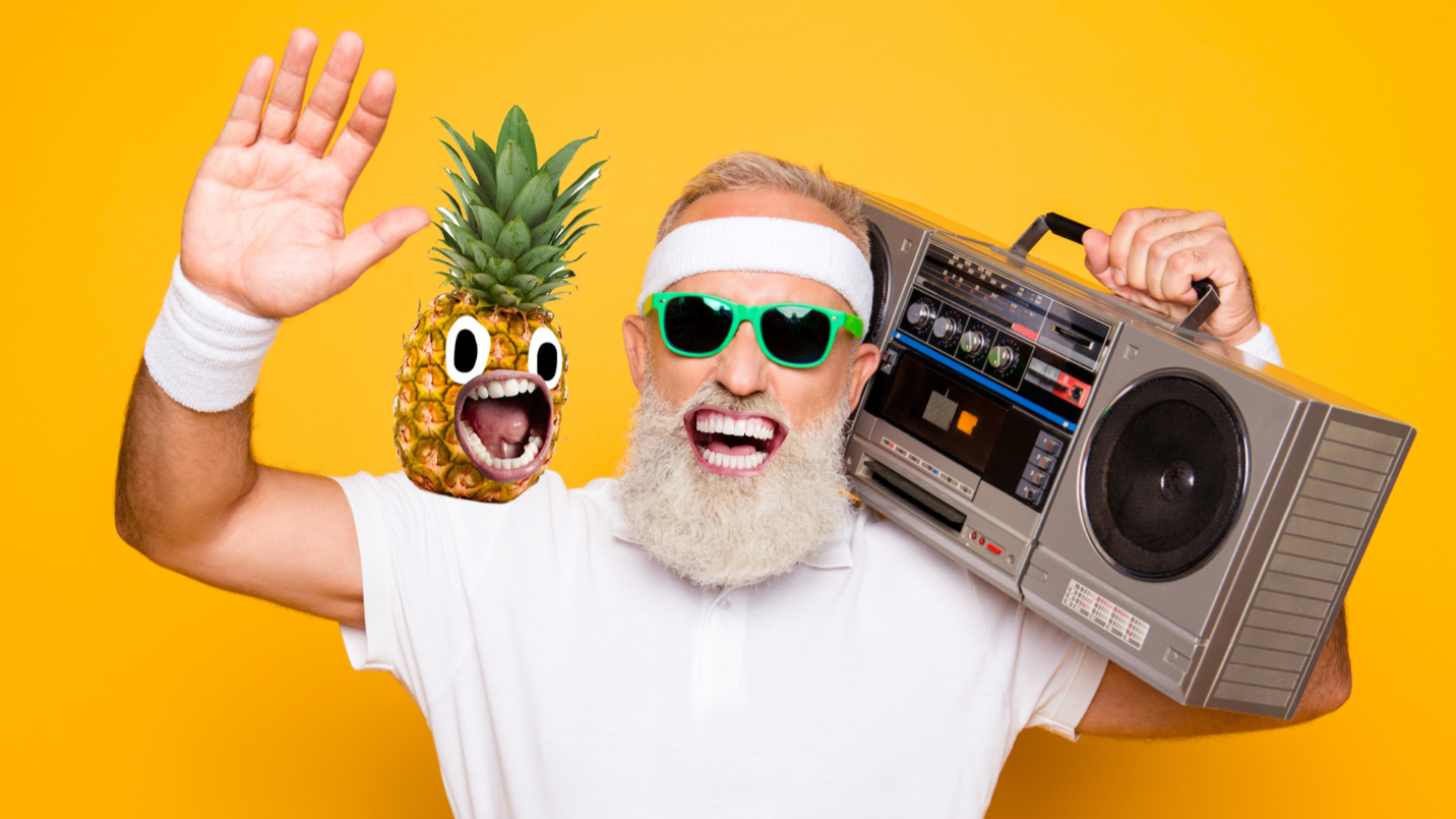 A man and a pineapple listening to music on a portable stereo