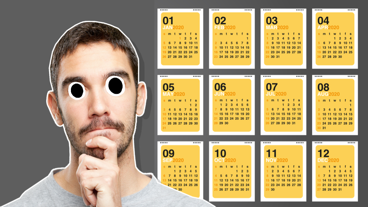 A man in front of a calendar