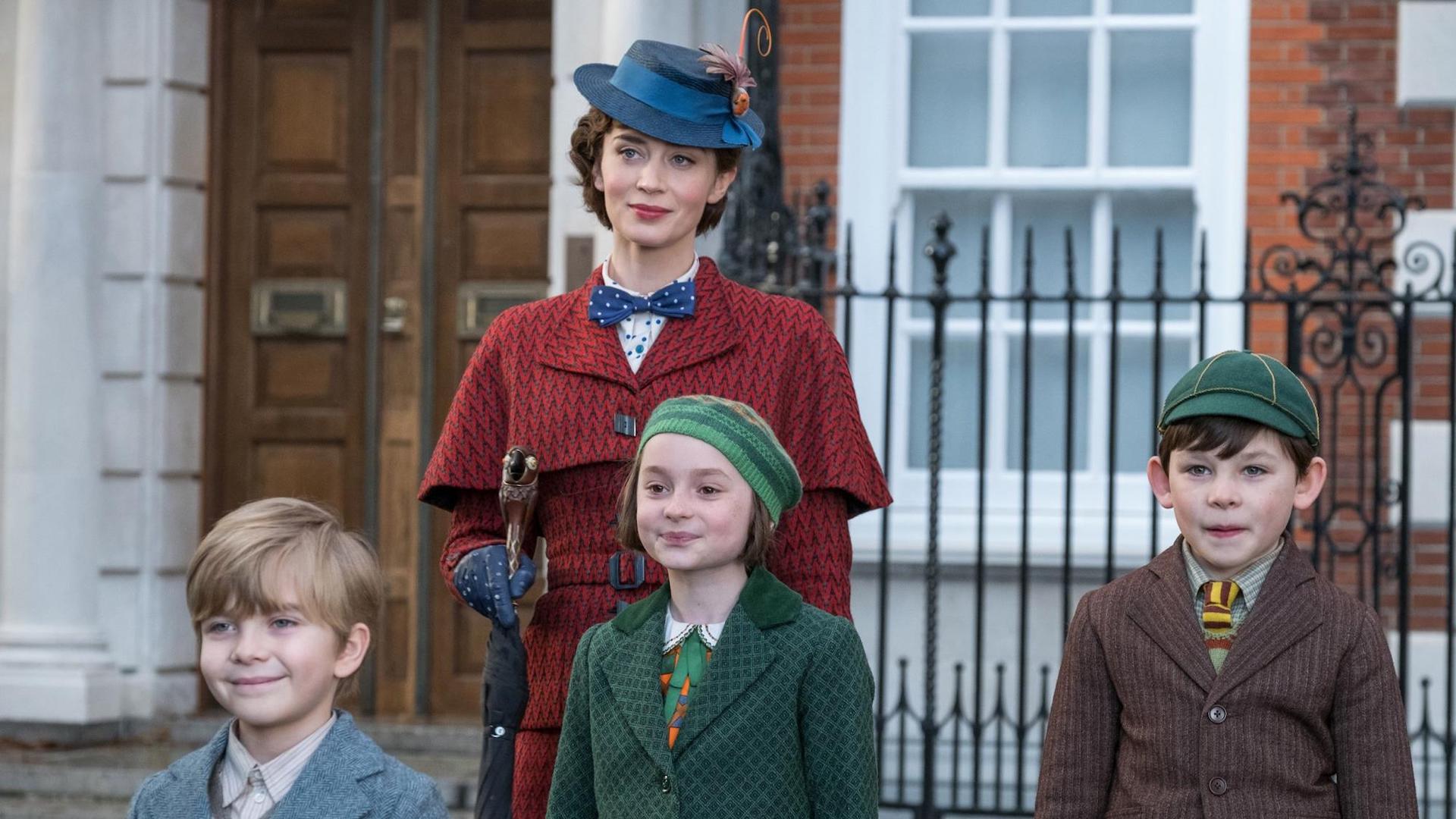 A scene from Mary Poppins Returns featuring Mary Poppins and the Banks children