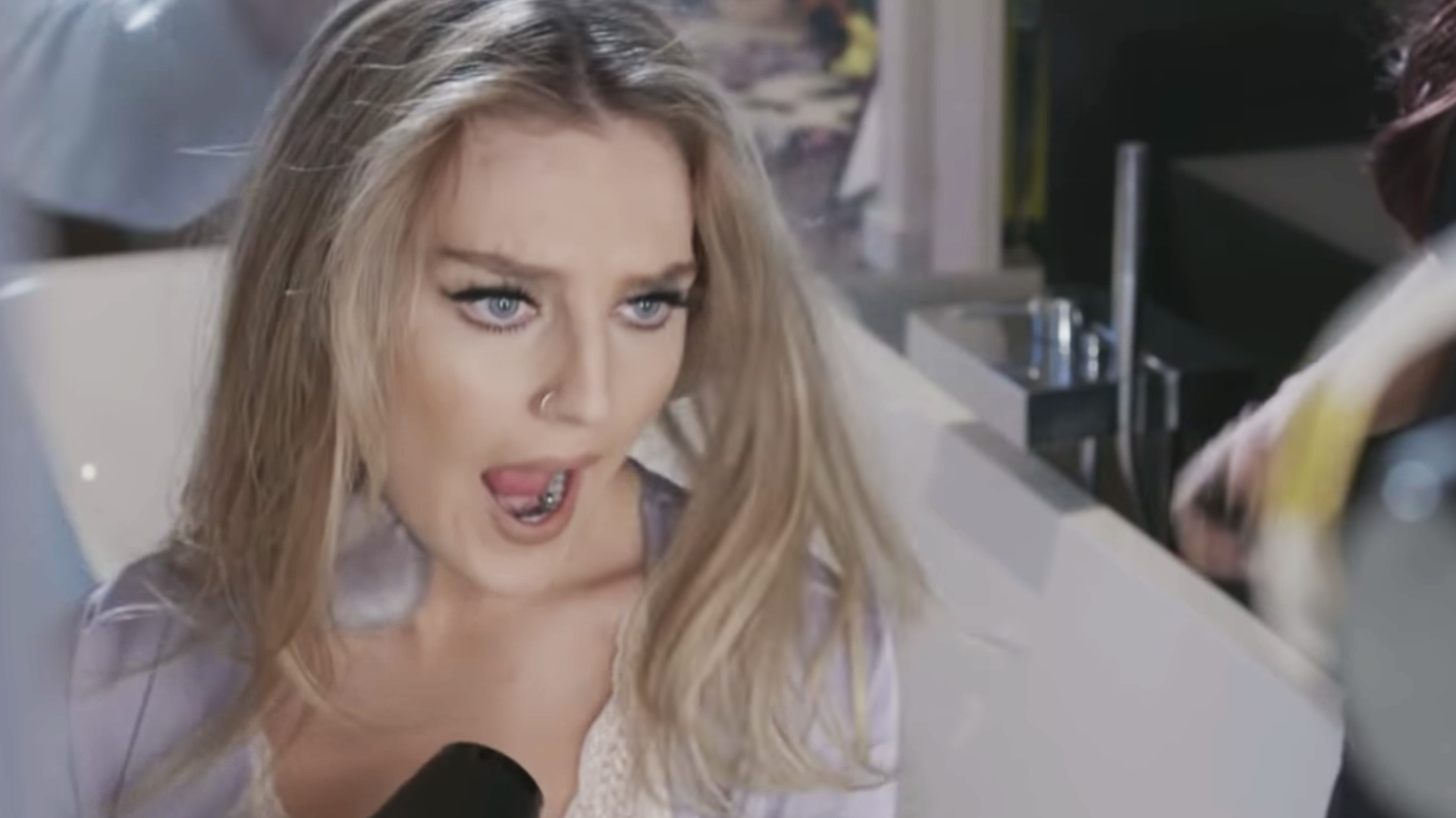 Perrie singing on the Wasabi video