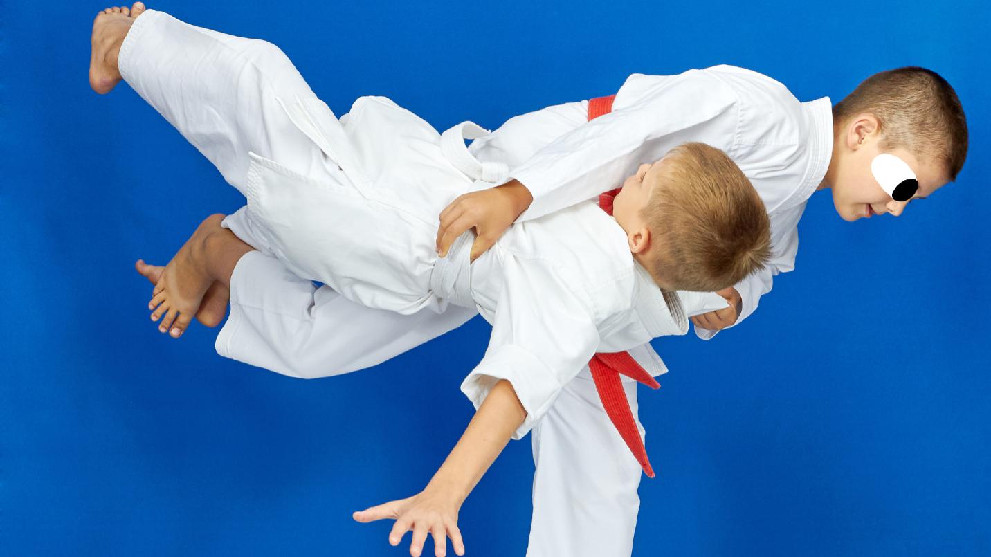 Two children practising Judo