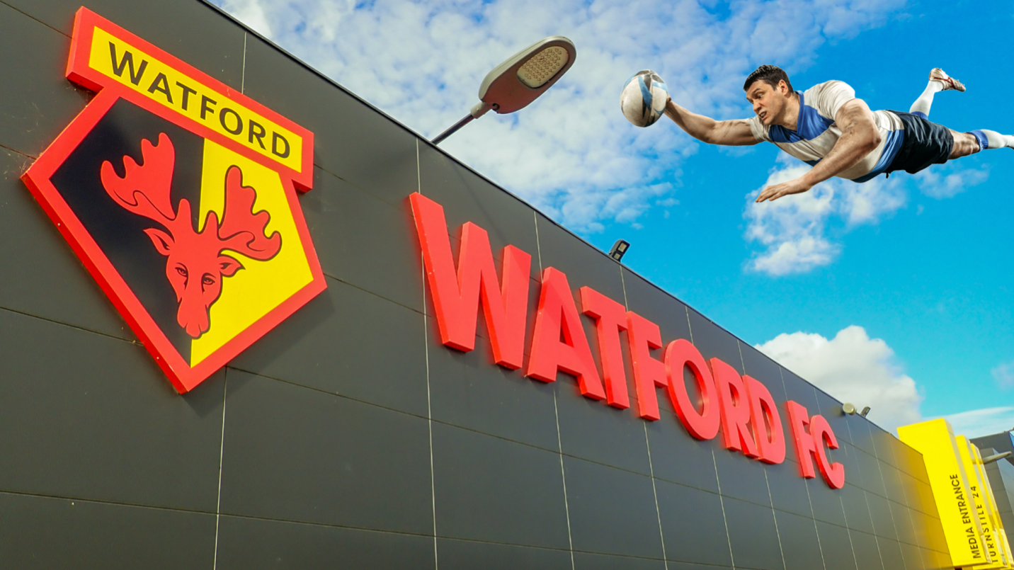 A rugby player diving into Watford's football ground