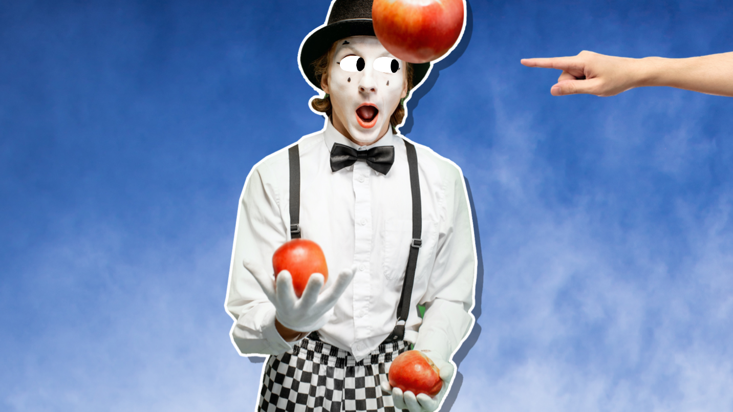 A clown juggling apples