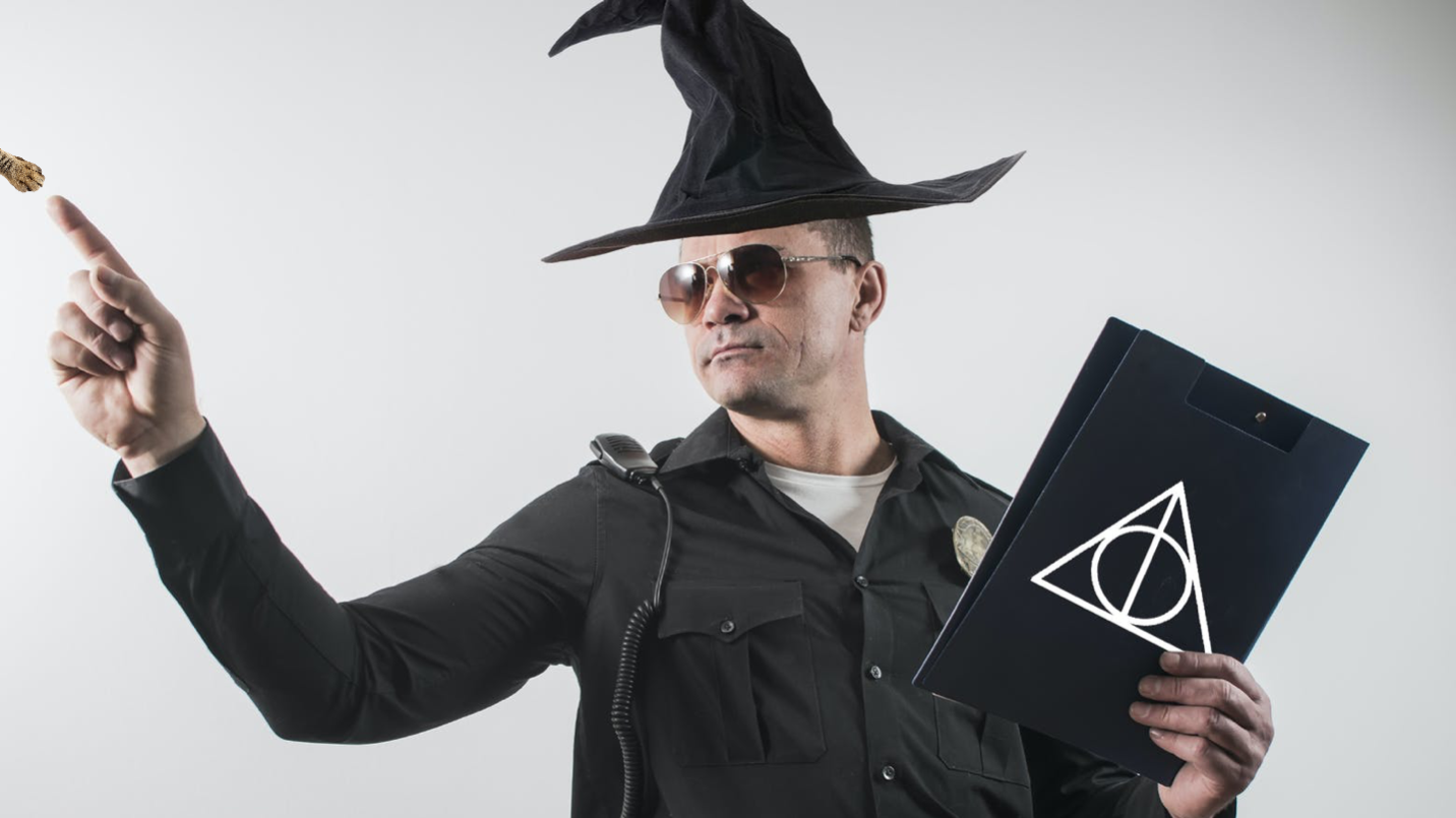 A police officer dressed as a wizard