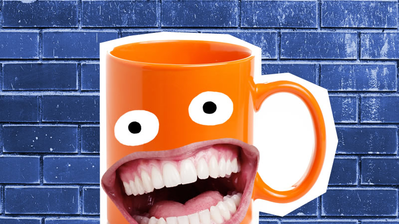 A grinning orange mug 