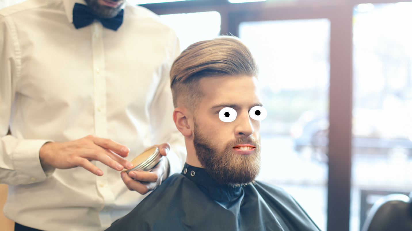A man at a barber shop