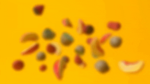 An animated GIF of fruit falling from the ceiling 