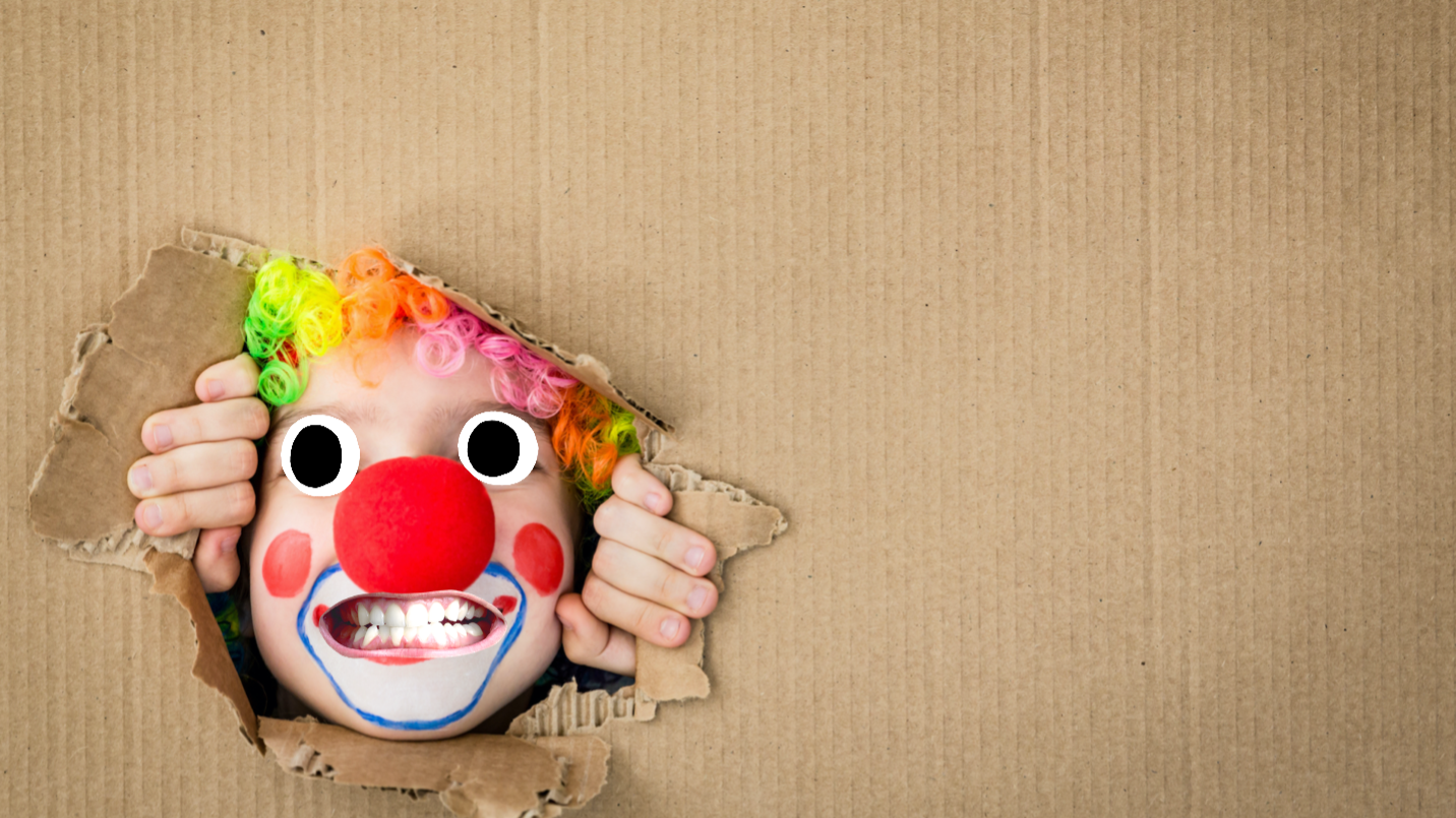 A clown peeking out of a cupboard