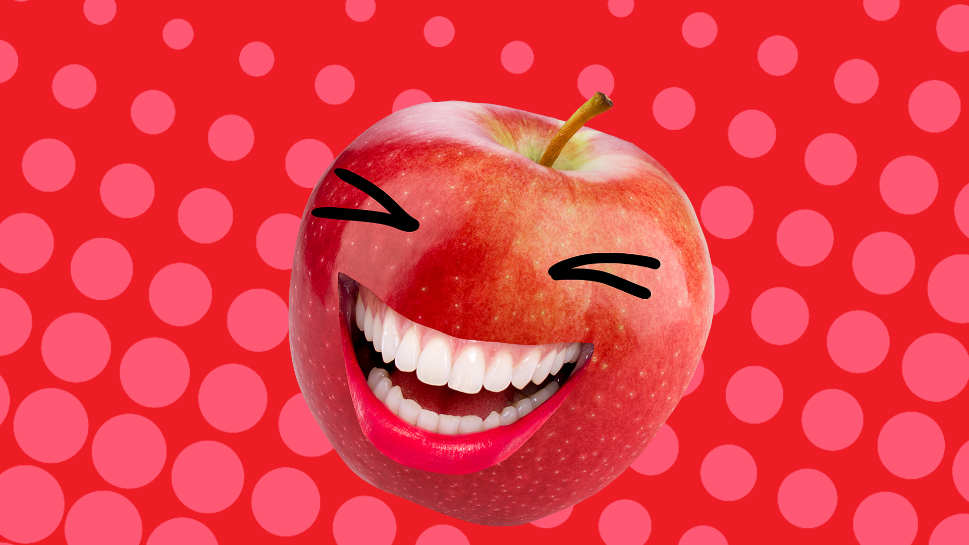 Laughing apple on red background