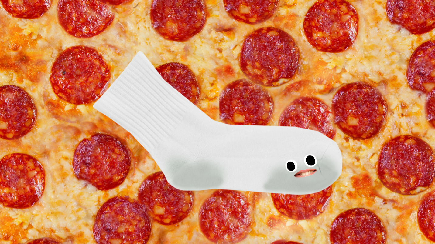 A yucky sock on a pizza