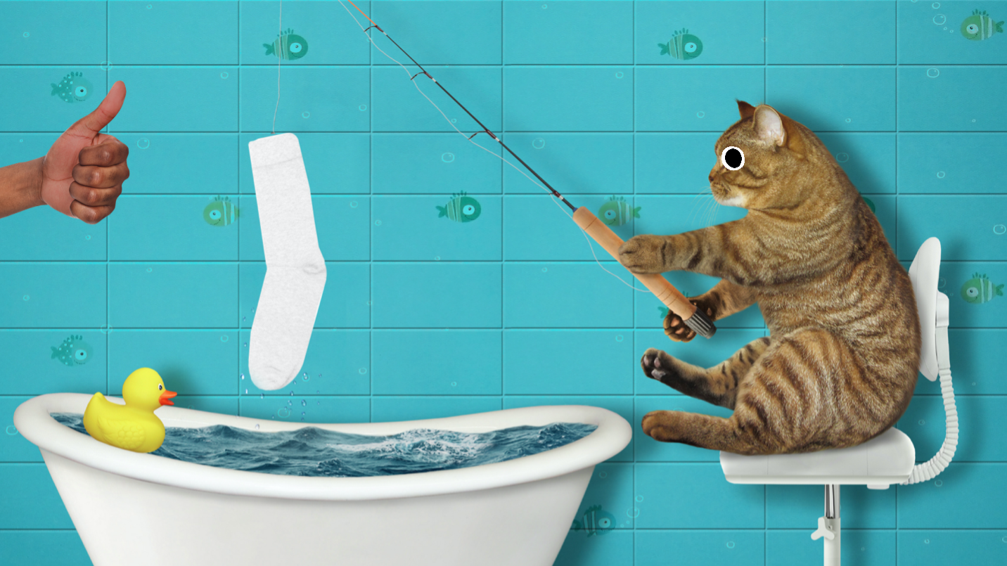 A cat fishing for socks in a bath