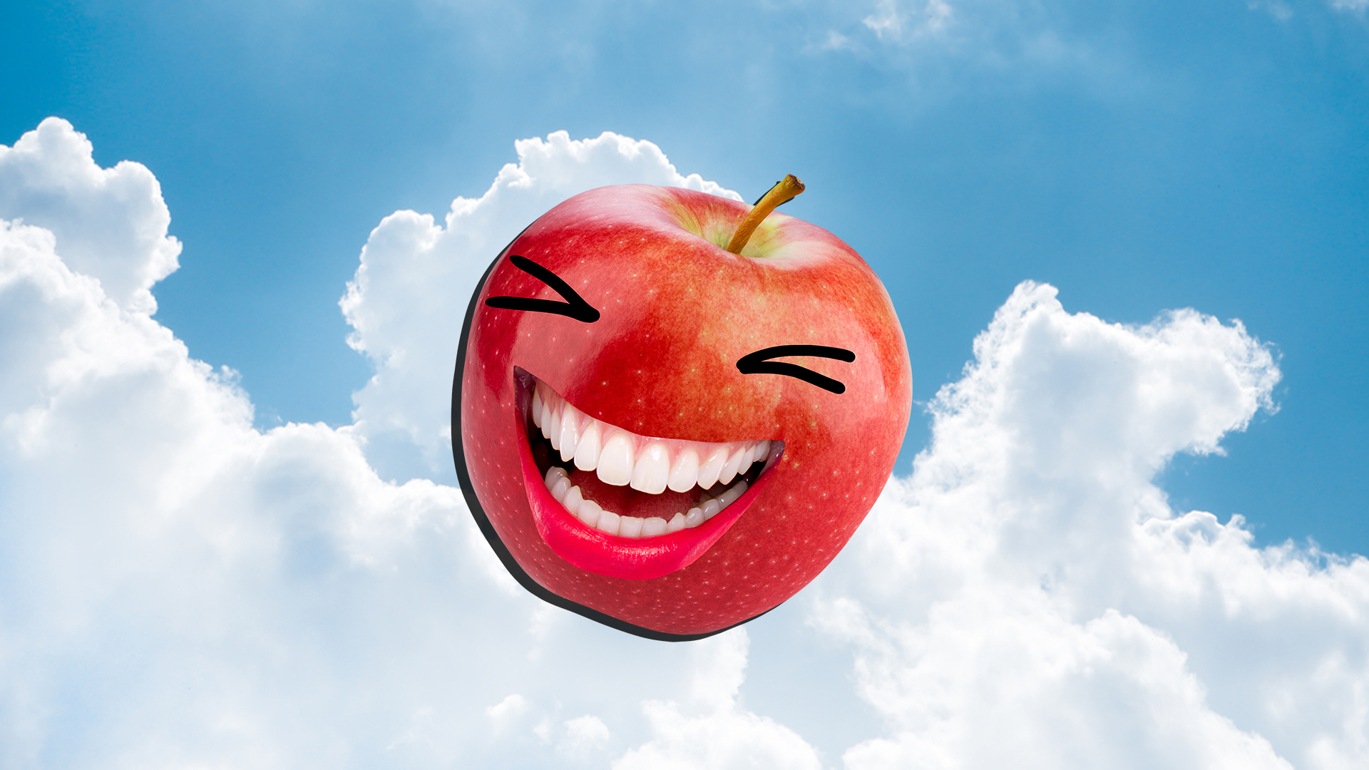 A laughing red apple in front of a cloudy and blue sky background