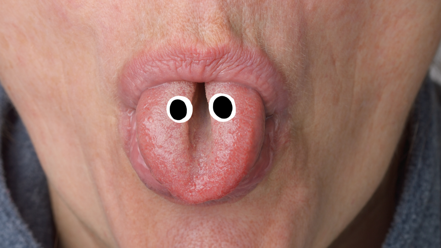 Person sticking tongue out with eyes on it