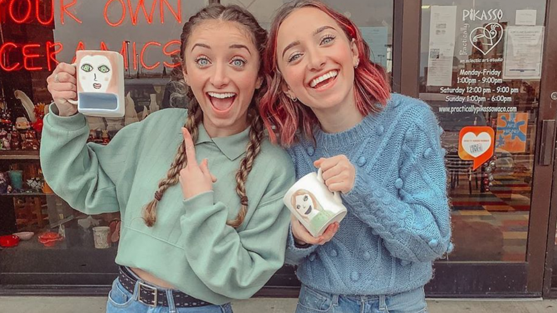 Brooklyn and Bailey holding two mugs