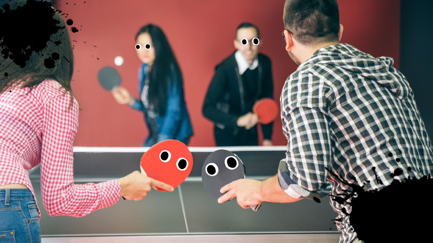 Group playing table tennis