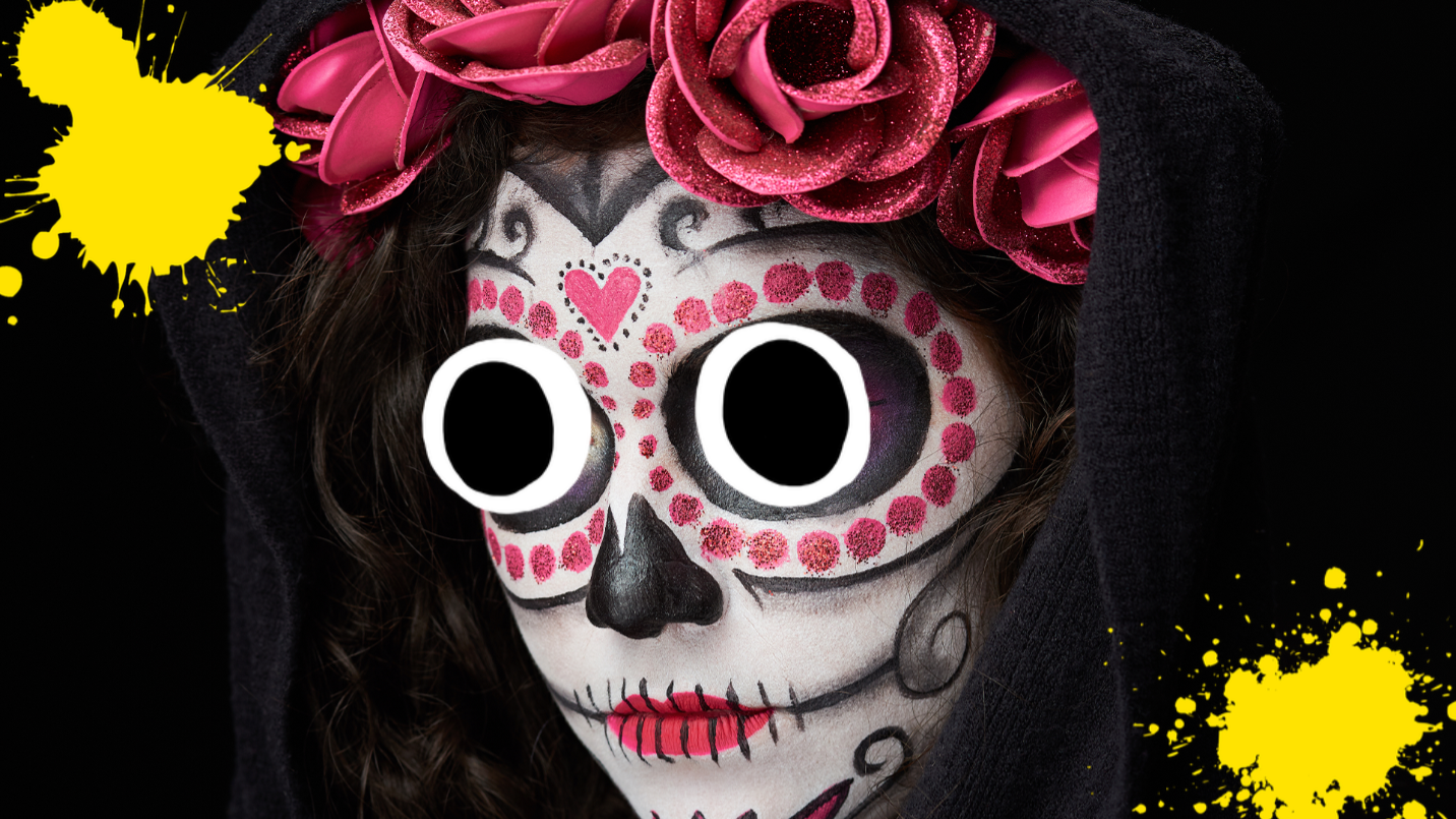 Woman on black background with Catrina style face paint