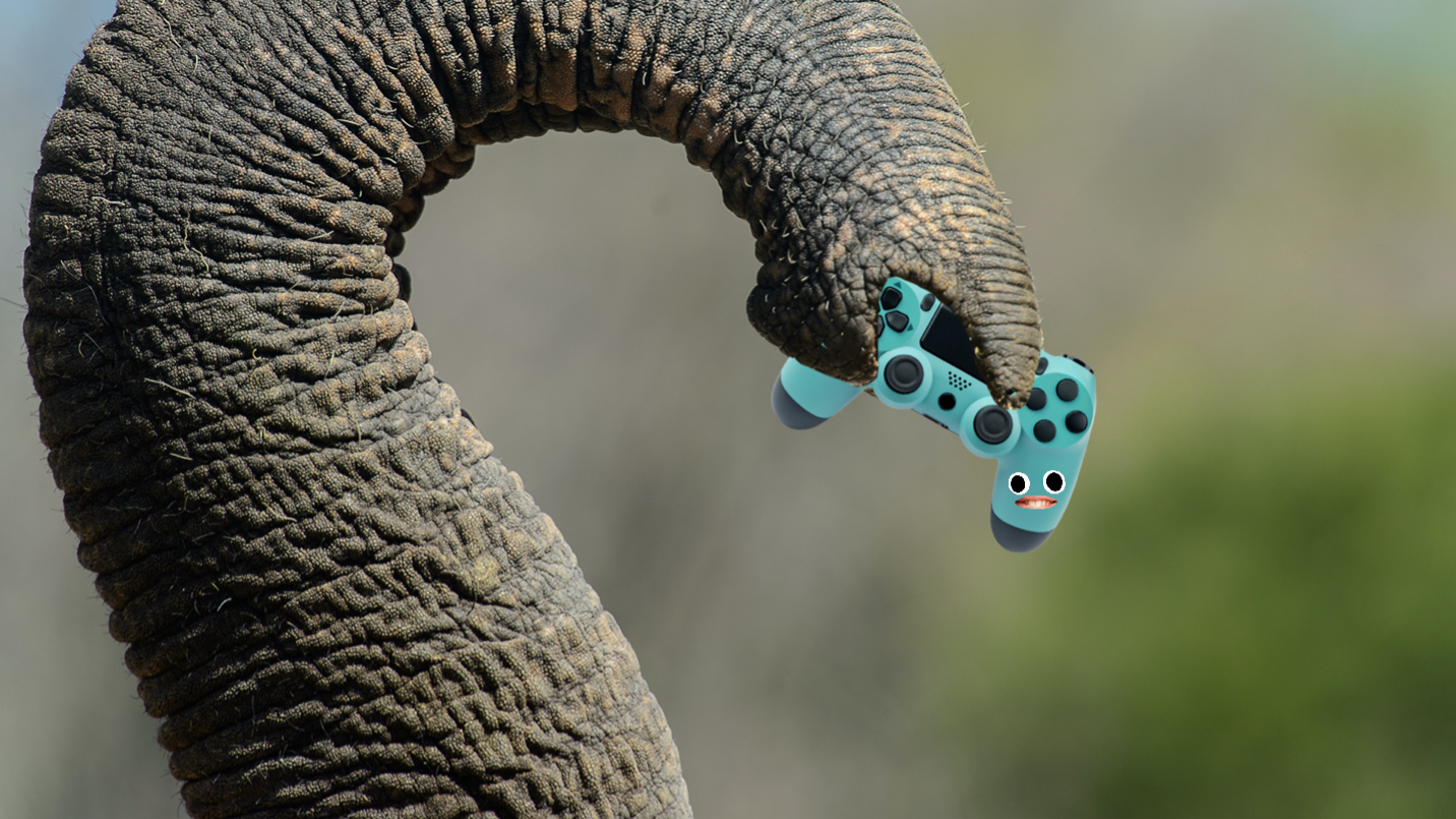 An elephant holding a game controller